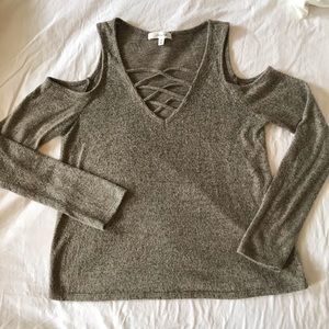 Sweater with shoulder cut outs